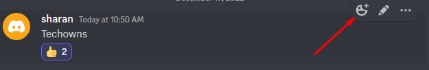 Using emoji to react to a message on Discord.